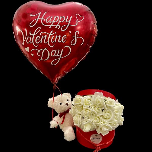 Heart-shaped Valentine balloon with a teddy bear and white rose box