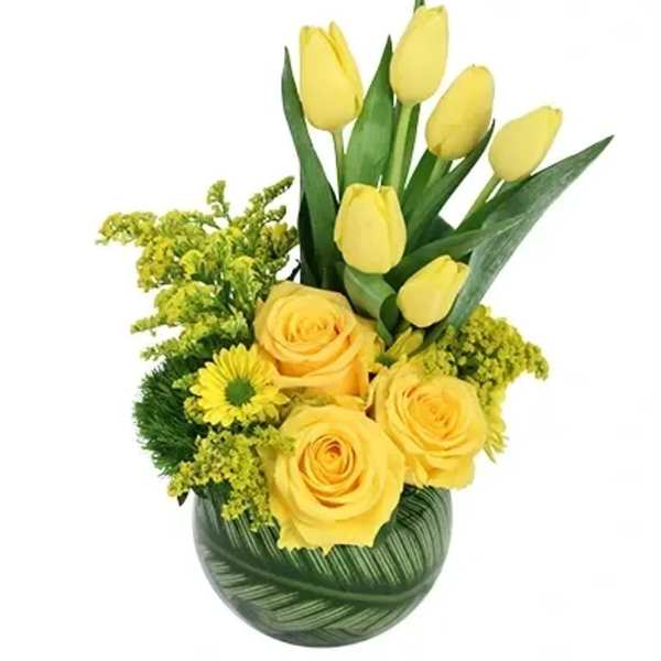 Yellow tulips and roses arranged in a green vase