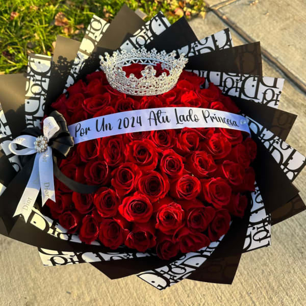 Bouquet of red roses with a silver crown and ribbon