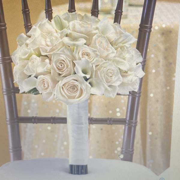 White rose bouquet in a wrapped handle