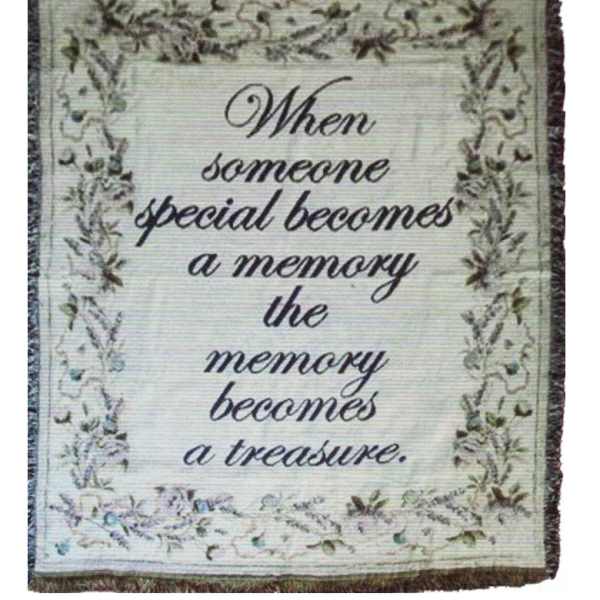 Decorative wall hanging with a memorial quote and floral border