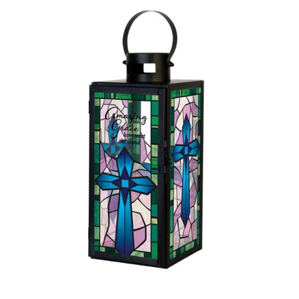Black metal lantern with stained glass cross design and Amazing Grace text in blue, green, and lavender tones