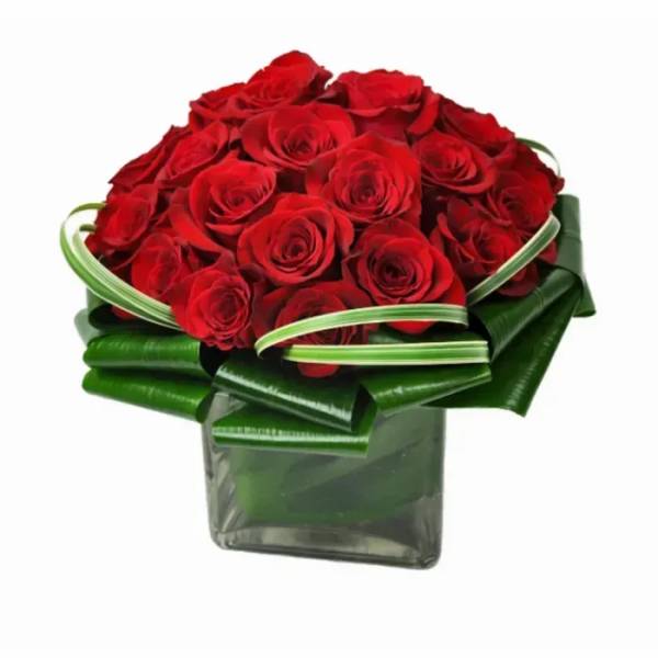Red rose bouquet in a square glass vase with green ribbon wrap