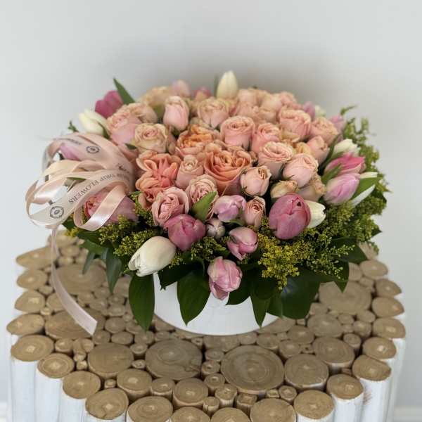 Pink and peach rose bouquet in a white box with ribbon