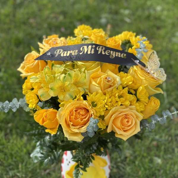 Yellow rose bouquet with mixed yellow flowers and a name banner