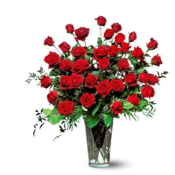 Bouquet of red roses in a clear glass vase