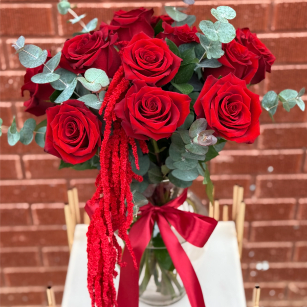 Dozen Red Roses with Amaranthus in a Vase.The photo shows the standard size.