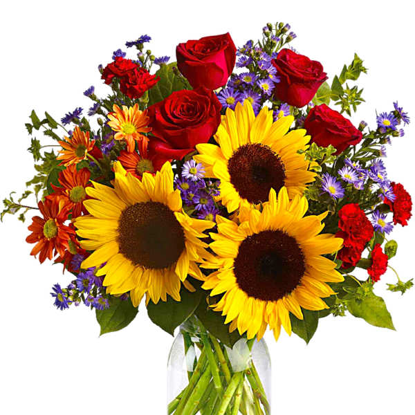 Bouquet of sunflowers, red roses, and purple daisies in a glass vase