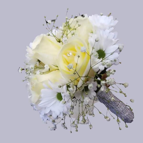 White and pale yellow bouquet with daisies and baby's breath