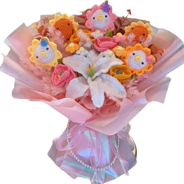 Crocheted flower bouquet with pastel pink wrapping and ribbon