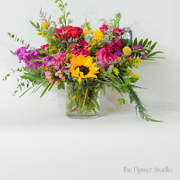 Colorful mixed bouquet in a clear glass vase