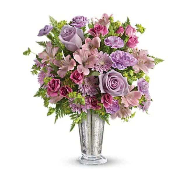 Lavender and pink bouquet in a clear glass vase