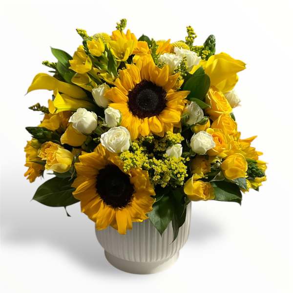 Yellow sunflower and rose arrangement in a white vase
