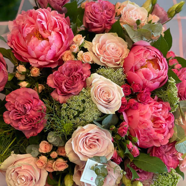 Pink and blush rose bouquet with peonies and small filler flowers
