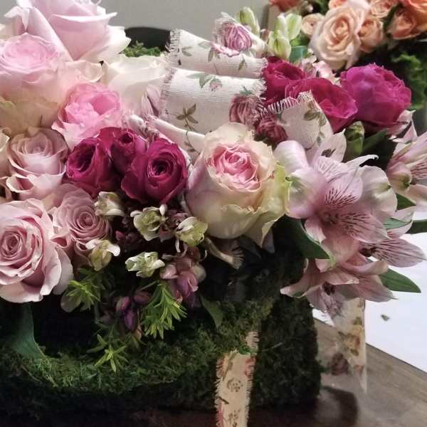 Pink and white rose bouquet with alstroemeria and ribbon