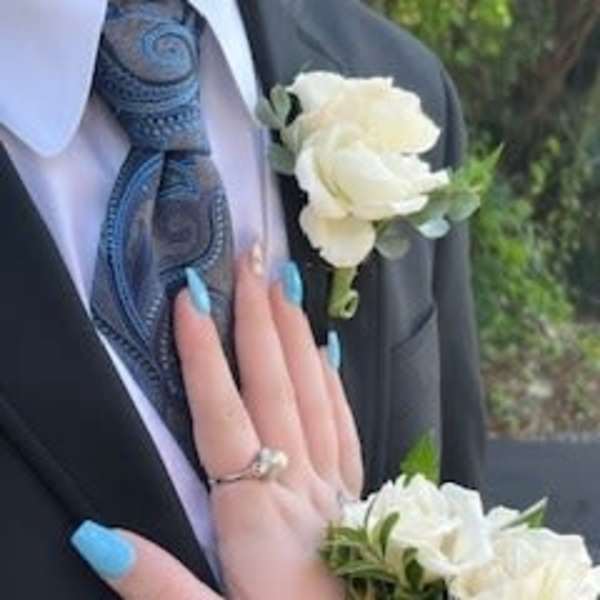 Neutral wrist corsage and boutonniere