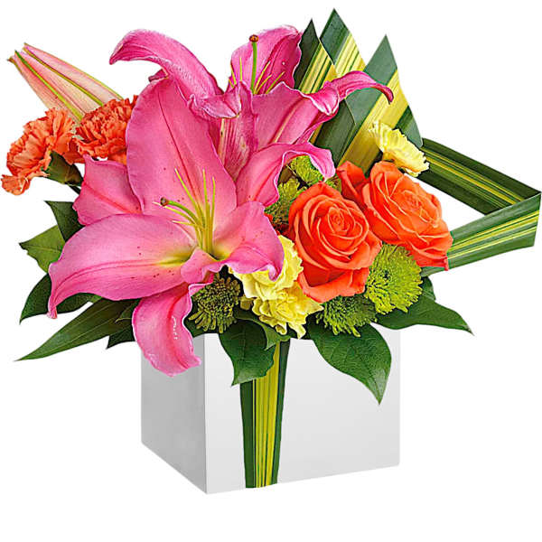 Pink lilies and orange roses in a white cube vase