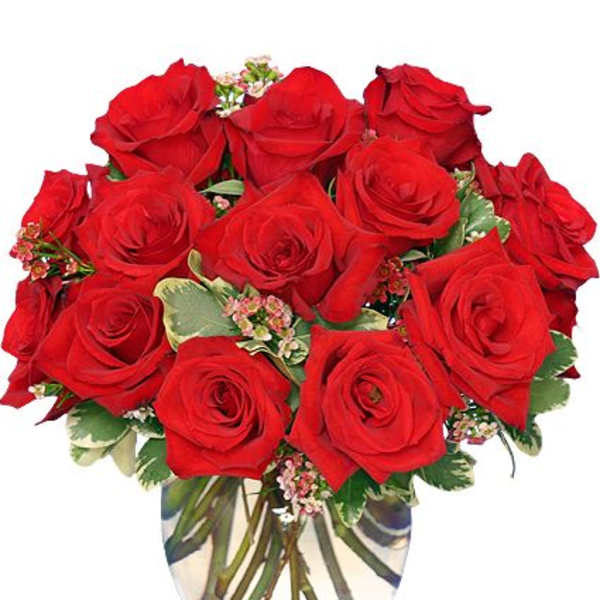 Bouquet of red roses in a clear glass vase