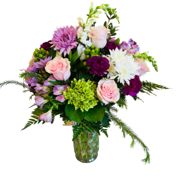 Pink and white mixed bouquet in a glass vase