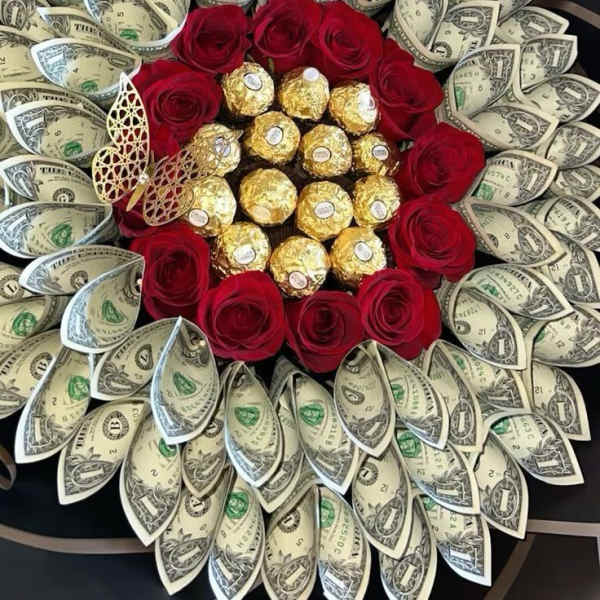 Bouquet of red roses with dollar bills and gold-wrapped chocolates