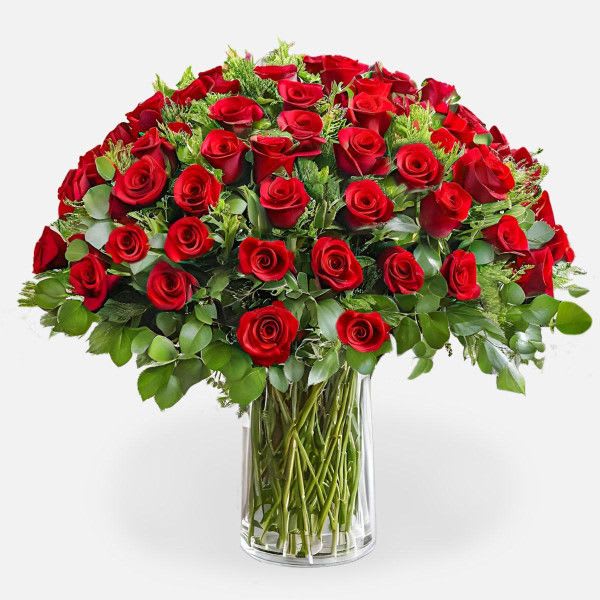 Bouquet of red roses in a clear glass vase