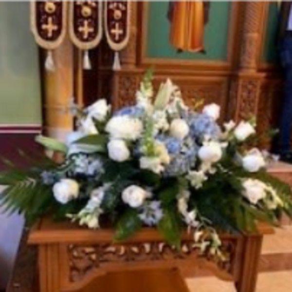Blue and White casket spray