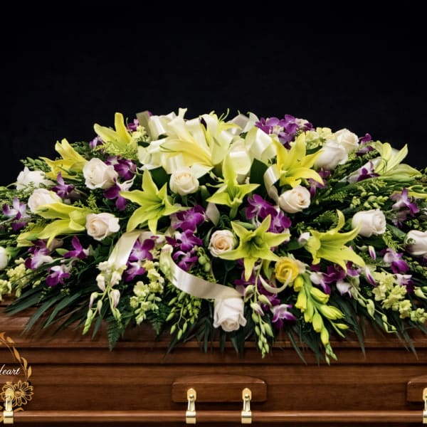 Orchid and Lily casket spray (FC10)