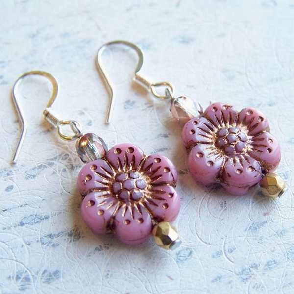 Pair of pink flower-shaped beaded earrings with gold hooks