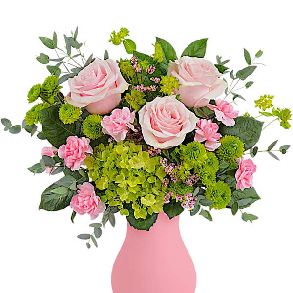 Pink roses and green blooms in a pink vase
