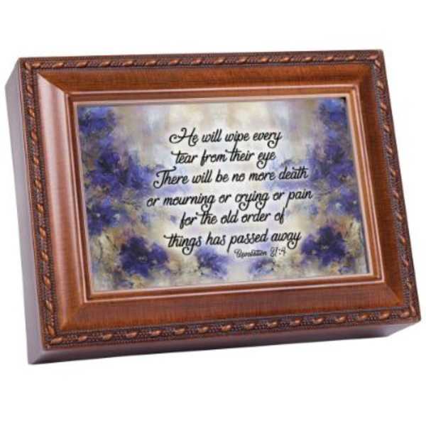 Framed memorial plaque with a Bible verse on a blue and white background