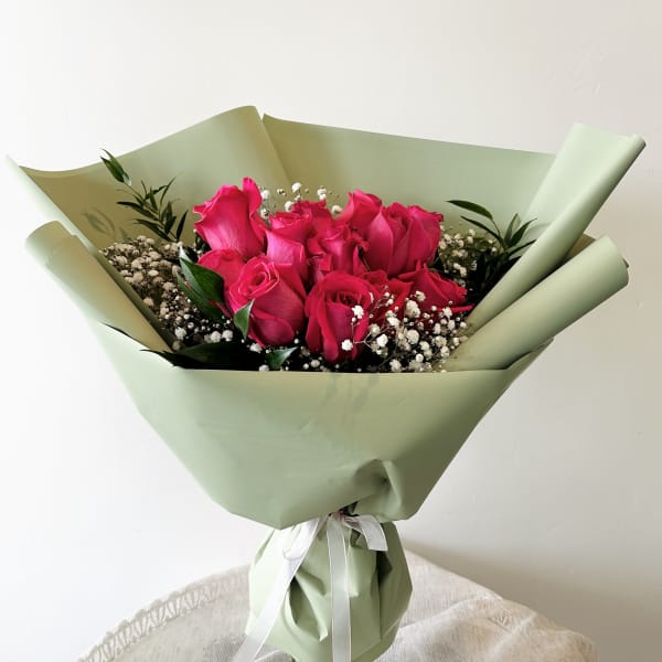 One Dozen Hot Pink Roses Hand Bouquet (Vase not included)