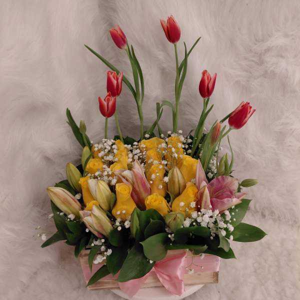 Garden of roses and tulips, beautiful floral arrangement of tulip
