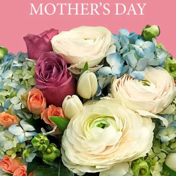 Bouquet of white, pink, and blue flowers against a pink Mother's Day background