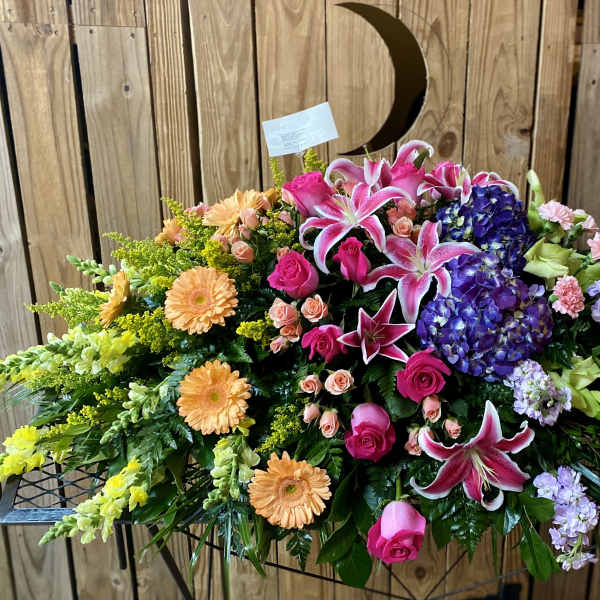 Large mixed floral spray with lilies, roses, hydrangeas, and gerbera daisies