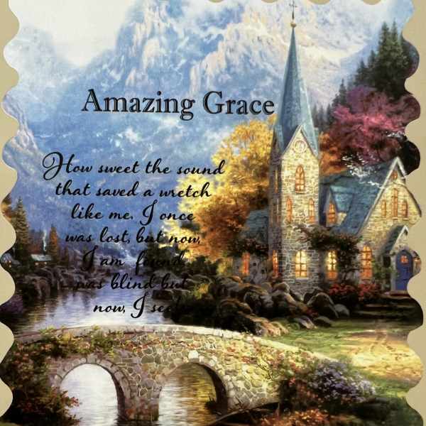 Decorative card with a church, bridge, and the words Amazing Grace