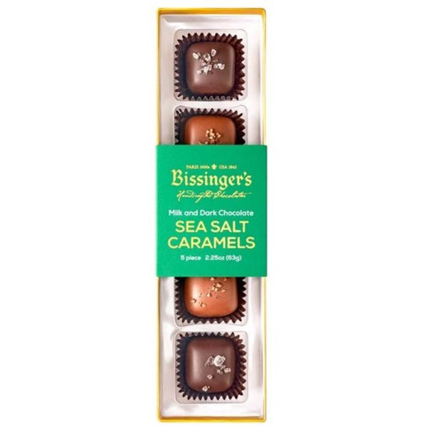 Box of sea salt caramel chocolates in a clear tray