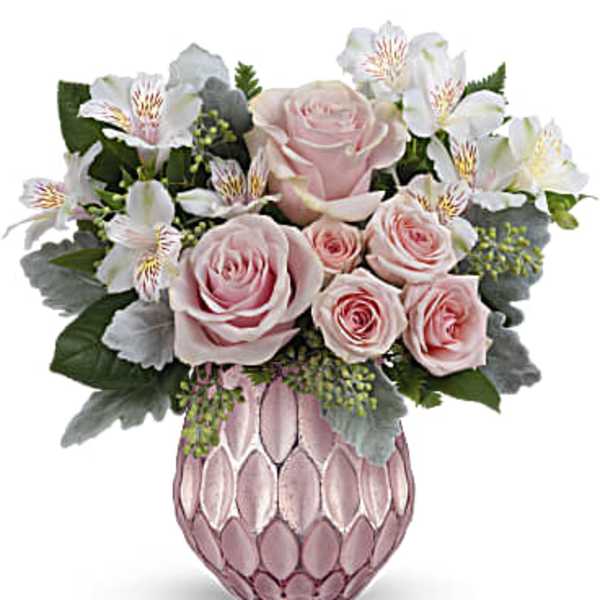 Pink roses and white alstroemeria in a pink textured vase