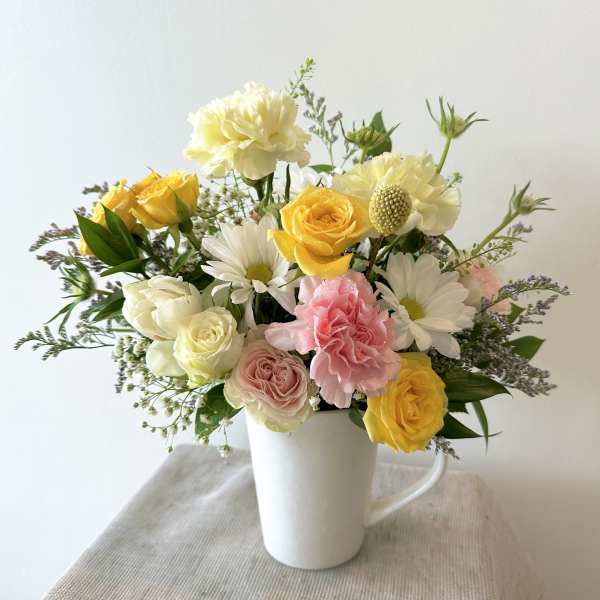 Mixed florist choice in a cup