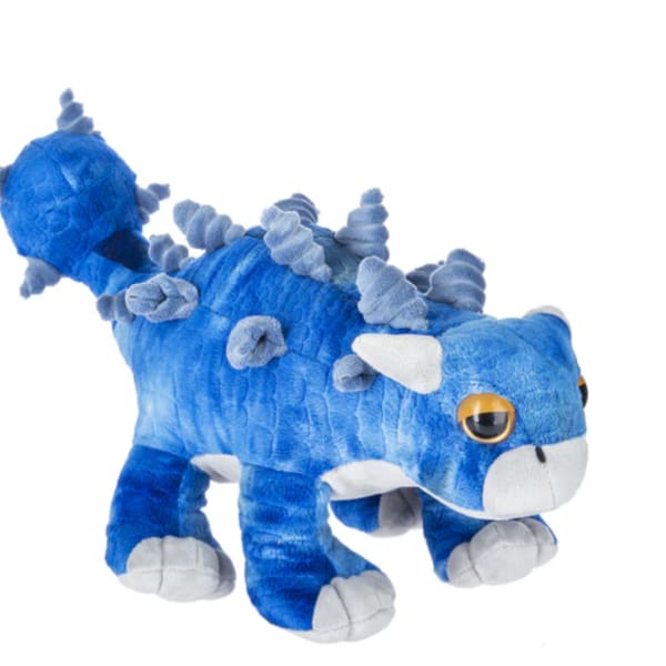 Blue plush dinosaur toy with gray spikes and white paws