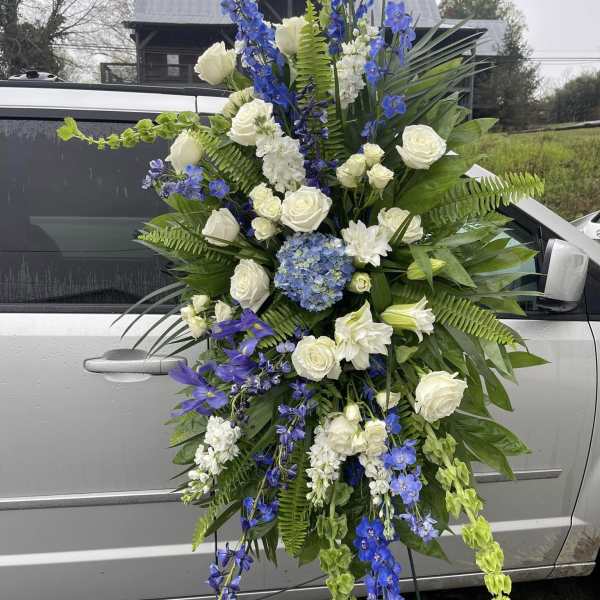 large sympathy spray white and blue