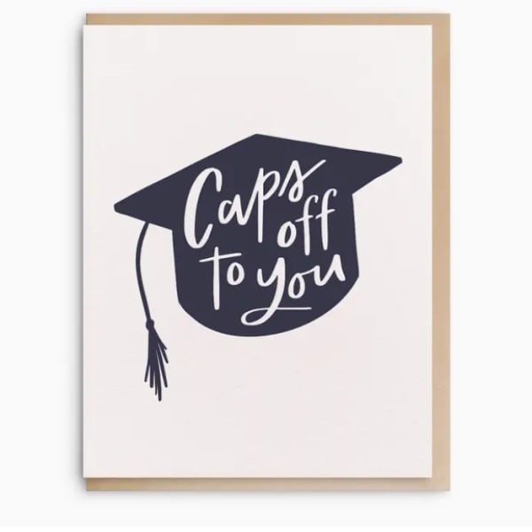 Greeting card with a graduation cap and the words "Caps off to you"