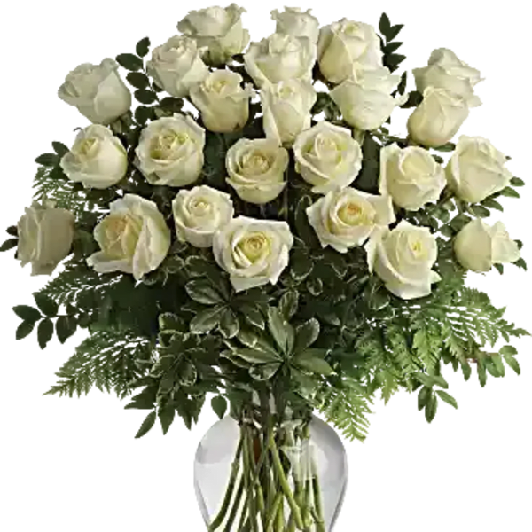 White roses arranged in a clear glass vase