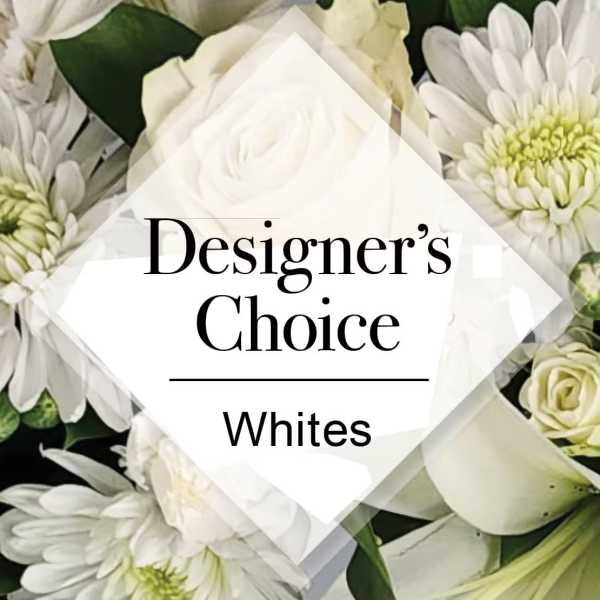 White floral arrangement with roses, daisies, and calla lilies