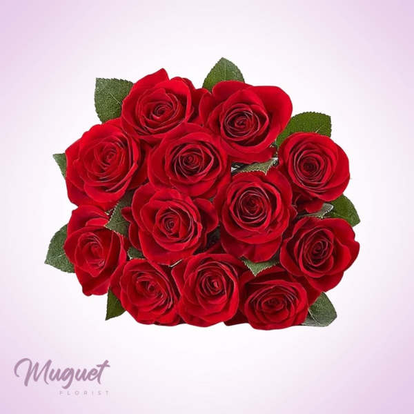 Bouquet of red roses with green leaves