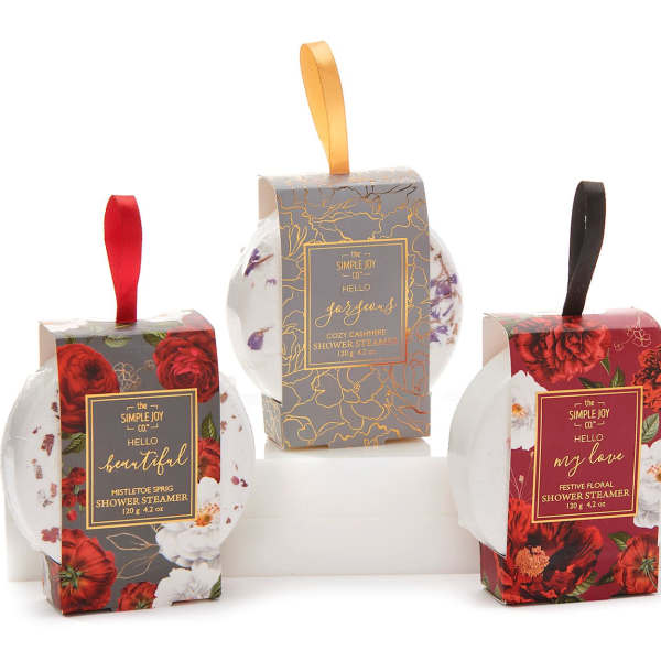 Three floral shower steamers in decorative boxes with ribbon loops