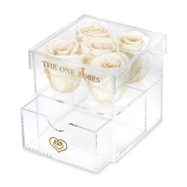 Clear acrylic box with white roses and a drawer below