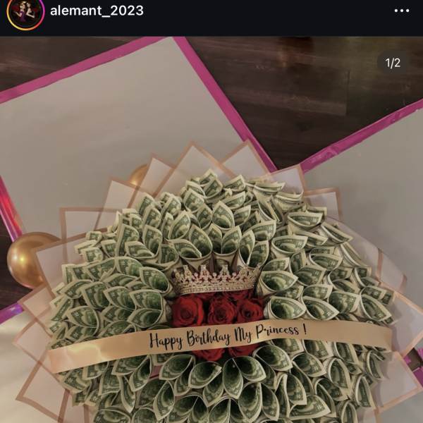 Money bouquet with red roses and a small crown