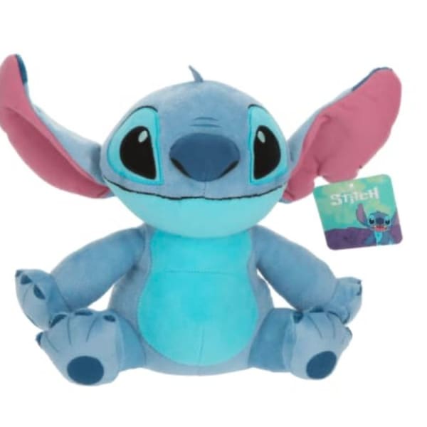 Blue Stitch plush toy with pink ears and a hanging tag