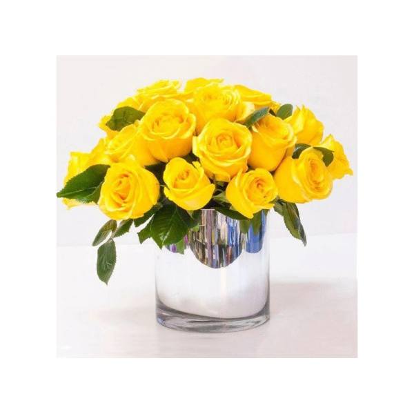 Bouquet of yellow roses in a clear glass vase