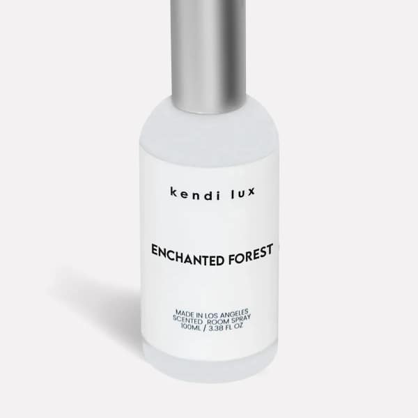 Bottle of scented room spray with a silver cap
